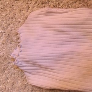 white ruffled mock neck top